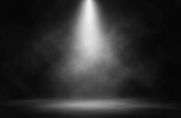 Photo of Stage white smoke spotlight background.