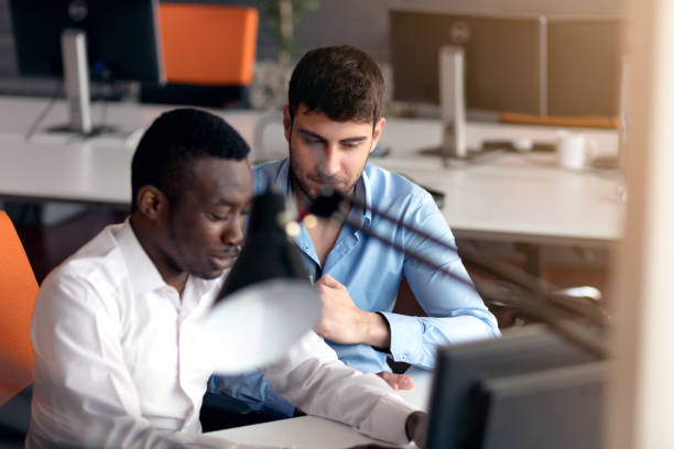 istock Black Male Designer Working At Desk In Modern Office 904008558