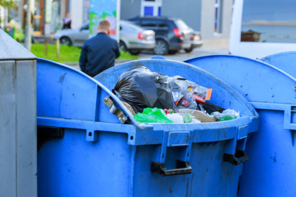 istock Trash bin at the side of street in with lip open 904008770