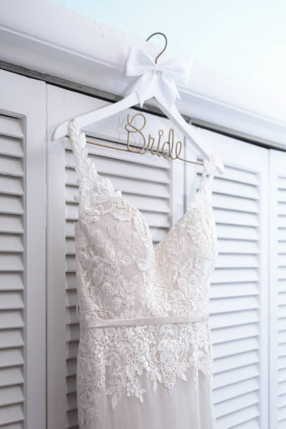 istock Wedding Dress hanging 904008776