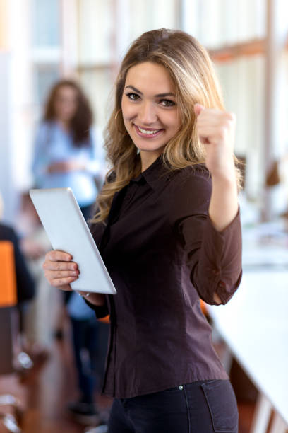 istock Team work discussing. Young woman with paper folder. 904008792