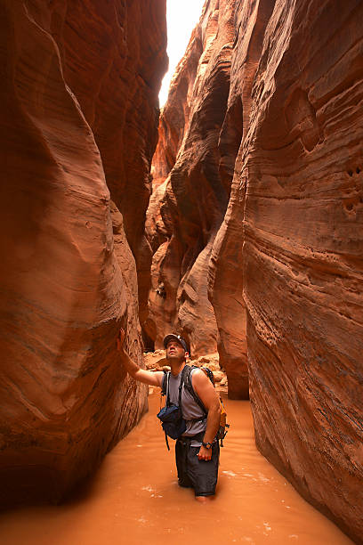 istock slot canyon man adventure landscape 90400919