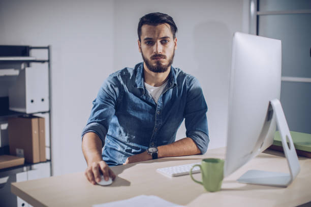 istock Young businessman in office 904015478