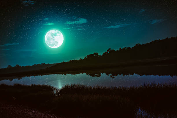 istock Night sky with full moon and many stars, serenity nature background. 904029516