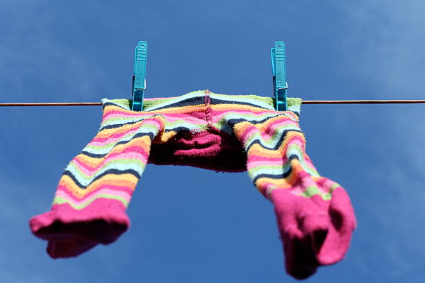 istock Stripy tights on washing line 90403013