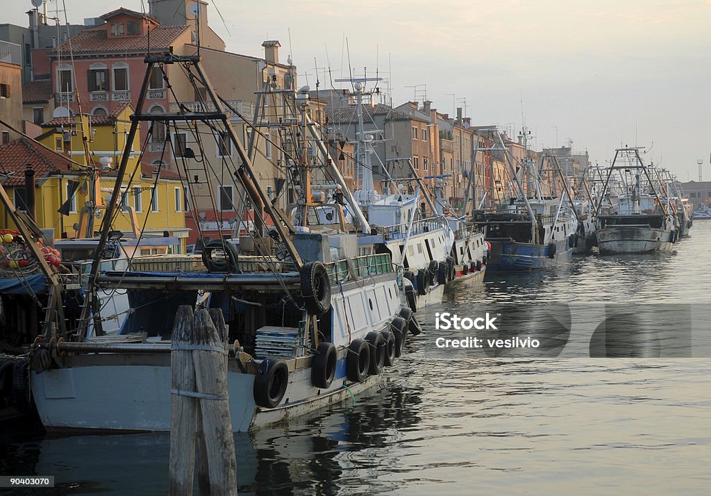 Fishing Boats Early morning, fishing boats are just back in Chioggia's harbour. Adriatic Sea Stock Photo