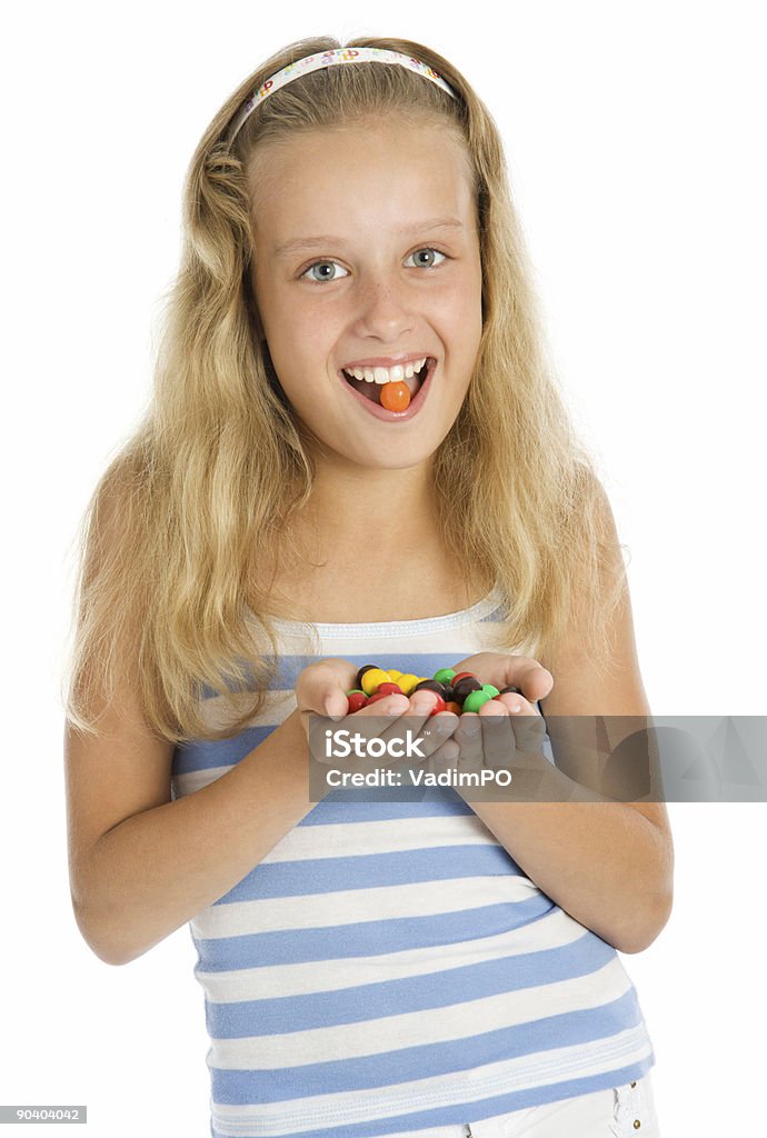 Młody uśmiechnięta Dziewczyna z kolorowe Czekolada Słodka - Zbiór zdjęć royalty-free (Białe tło)