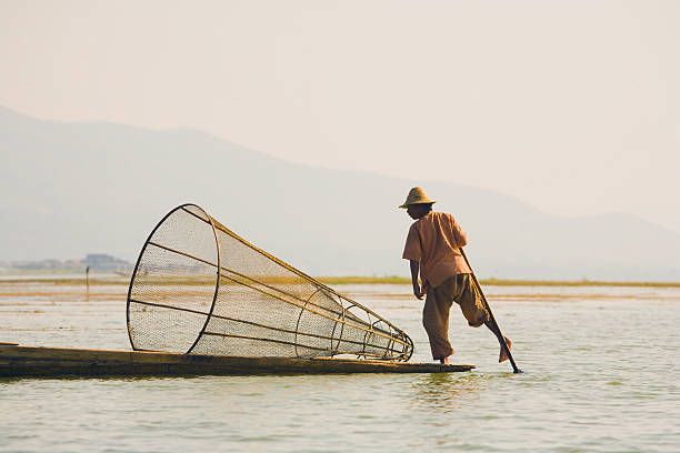 istock Myanmar: Leg-Rowing Fisherman on Inle Lake 90404214