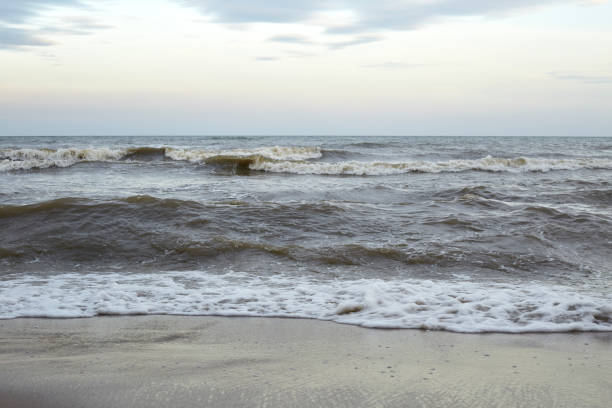 istock Beautiful clear  water lapping on the shore 904043812