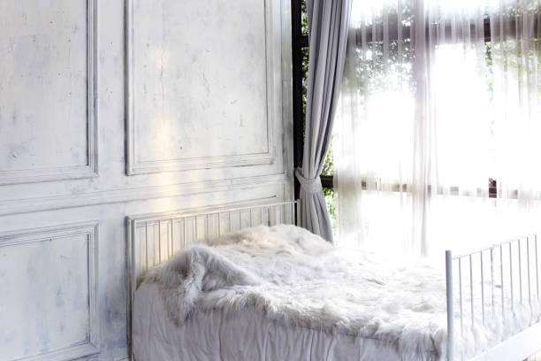 istock white bedroom with window and curtain 904044208