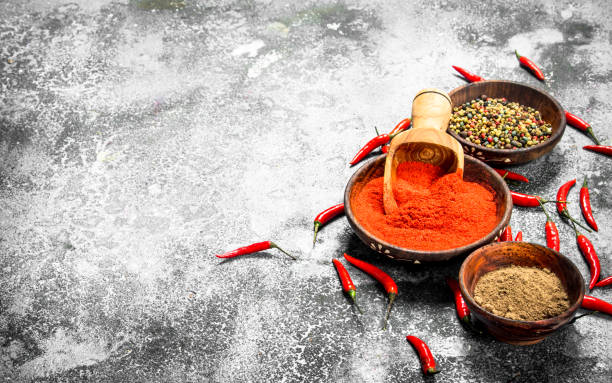istock Ground red hot chili peppers in a bowl. 904044646
