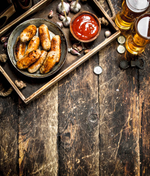 istock Hot sausages with cold beer. 904048108
