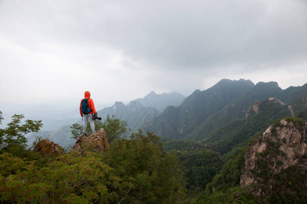 istock man on the top of mountaion 904048806