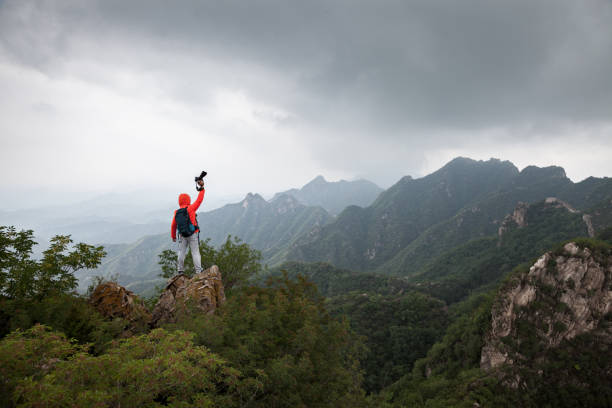 istock man on the top of mountaion 904048826