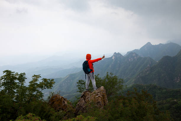 istock man on the top of mountaion 904048852