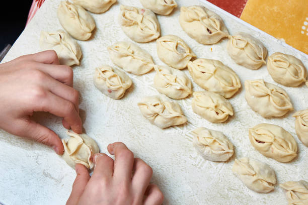 istock Making homemade dumplings with minced meat 904049088