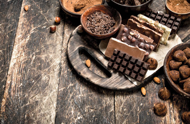 istock Chocolate bars with truffles and cocoa powder. 904051984