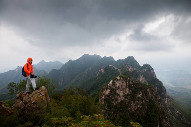 man on the top of mountaion
