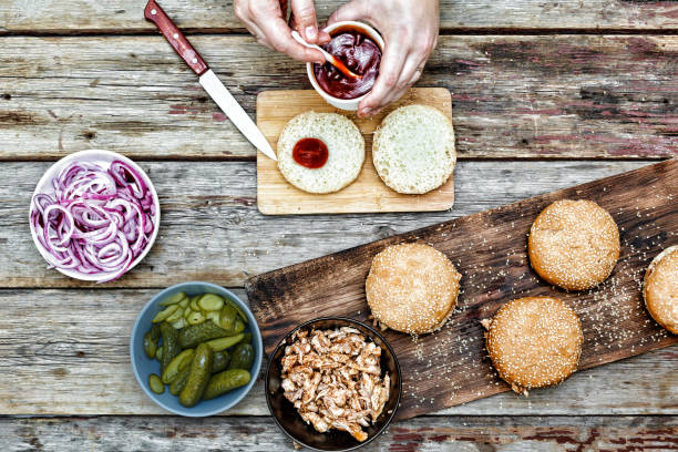 istock cooking burgers. the process of making home-burger 904056390