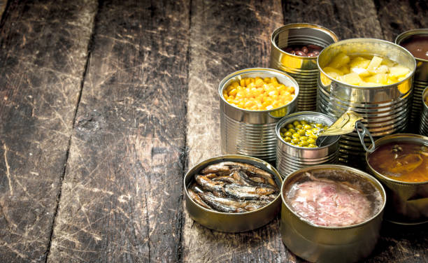 istock Various canned vegetables, meat, fish and fruits in tin cans. 904056902