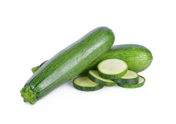 istock whole and sliced fresh zucchini on white background 904057428