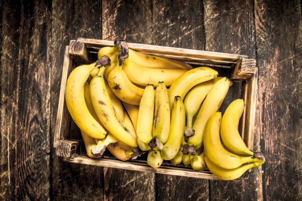istock box of fresh bananas. 904060122