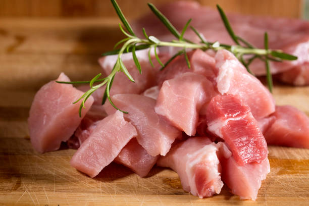istock Raw pork ready to Cook on a wooden cutting board 904060140