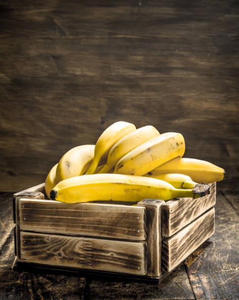 istock box of fresh bananas. 904060346