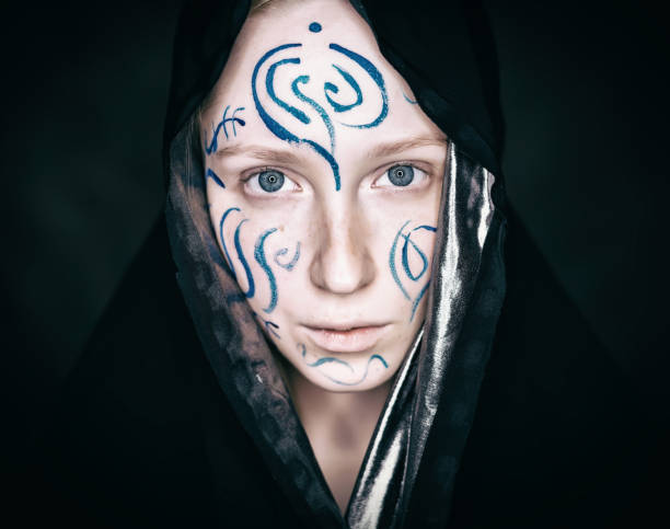 istock Woman with paint on her face. 904063710