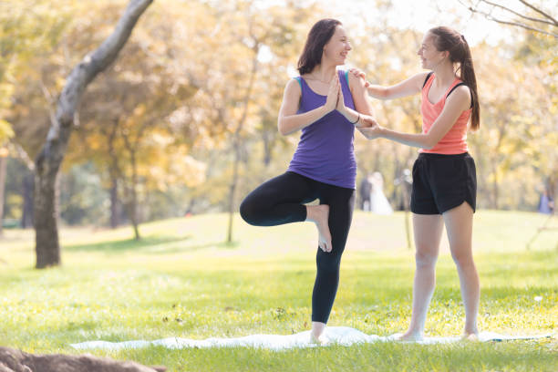 istock Holiday young woman doing yoga 904063776