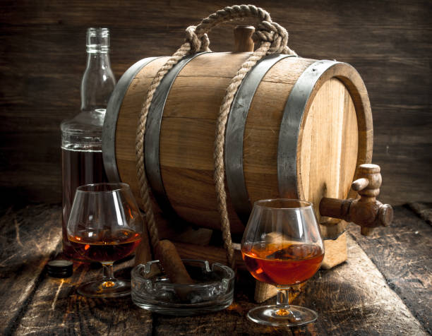 istock Barrel with French cognac, glasses and a cigar. 904063944