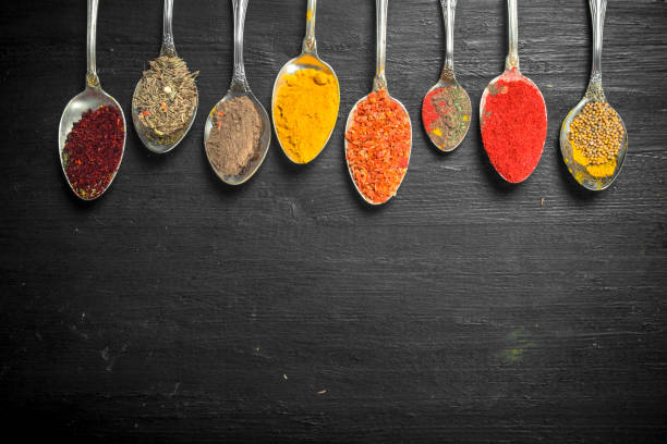 istock Ground spices and herbs in spoons. 904064350