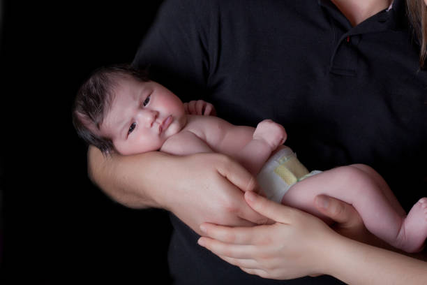 istock Happy mother with newborn baby 904068866