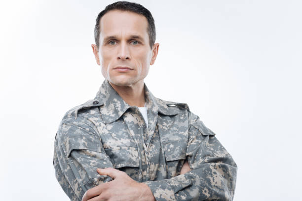 istock Confident handsome man standing cross handed 904069296