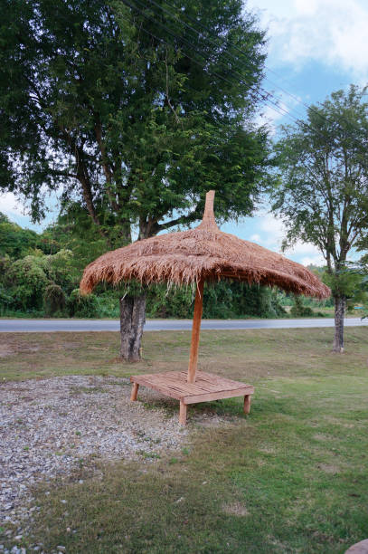 istock Wooden bench beside a street 904069358