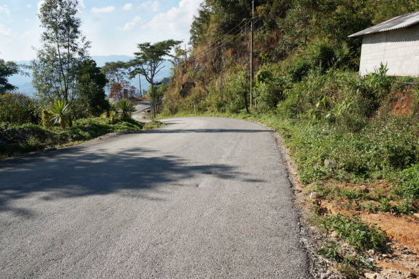 istock asphalt road through the rural village on a mountain 904069392