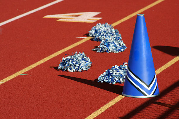 Cheerleader pom poms and megaphone  cheerleader photos stock pictures, royalty-free photos & images