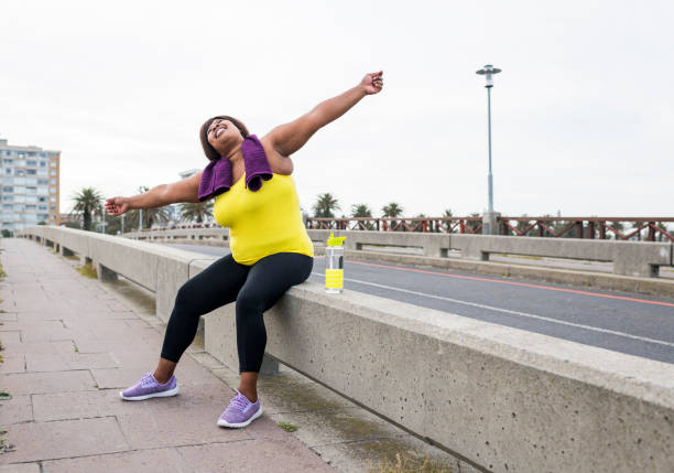 istock Woman stretching on a bridge 904072388