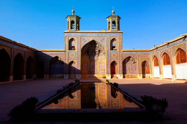 istock Colorful Mosque Nasir al Mulk in Shiraz. Reflection in water. 904072636