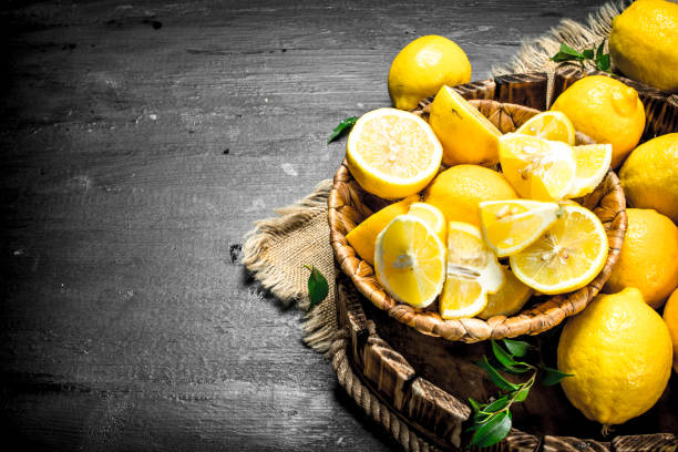 istock Pieces of fresh lemons in a basket. 904074938