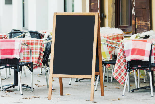 istock Blank menu chalkboard mockup on the street 904075352