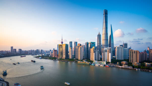 Panorama of Shanghai Skyline Aerial view of modern skyscrapers in Lujiazui Financial District at dusk. promenade shanghai stock pictures, royalty-free photos & images