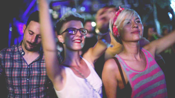 istock Friends dancing on the concert 904079026