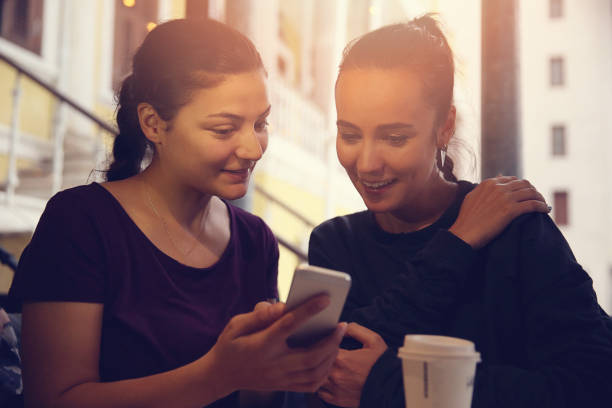 istock Female friends talking in cafe 904079052