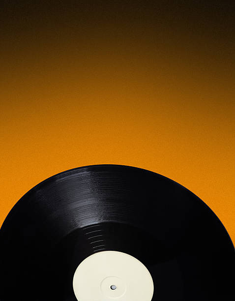 istock Colorful retro vinyl record with bright orange background 90408092