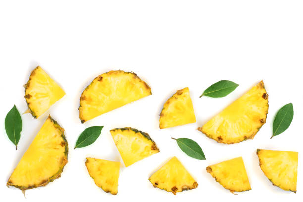 istock Sliced pineapple with green leaves isolated on white background with copy space for your text. Top view 904082328