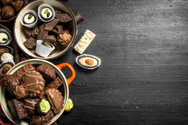 istock Chocolate candies in a bowls. 904083922