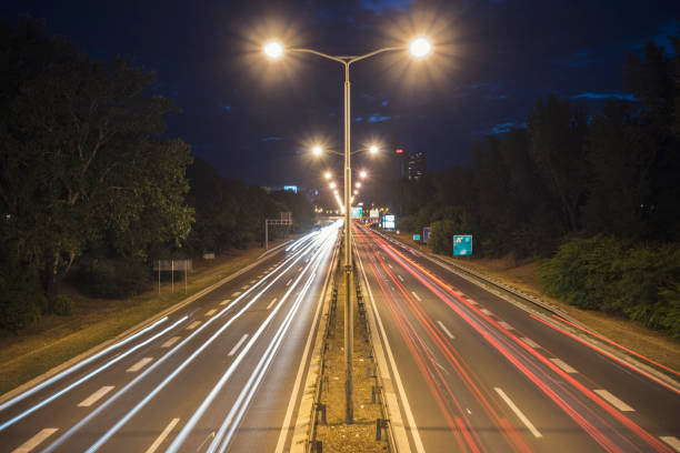 istock Blurred motion of traffic on highway 904083972