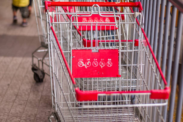 istock Push Cart lined up ouside of a store 904084576