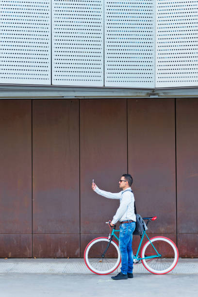 istock Man making a selfie with sunglasses on the street 904097316